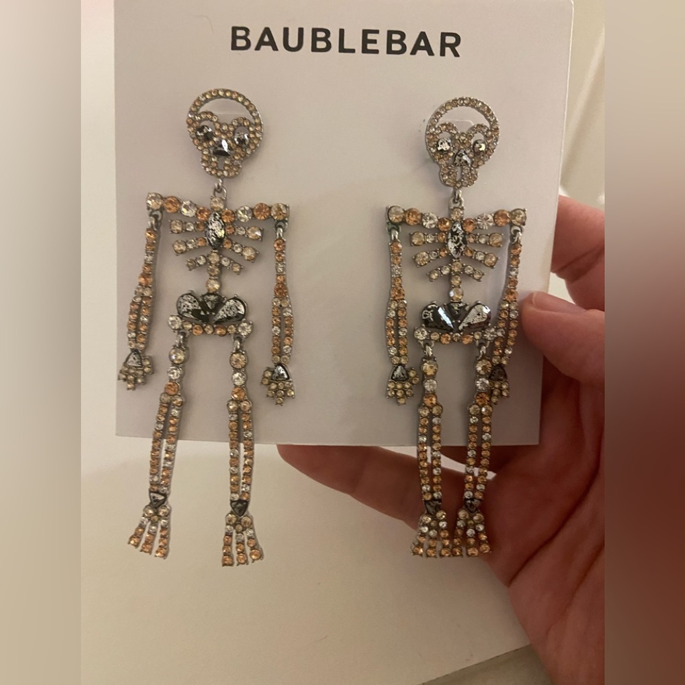 Halloween skeleton earrings.
